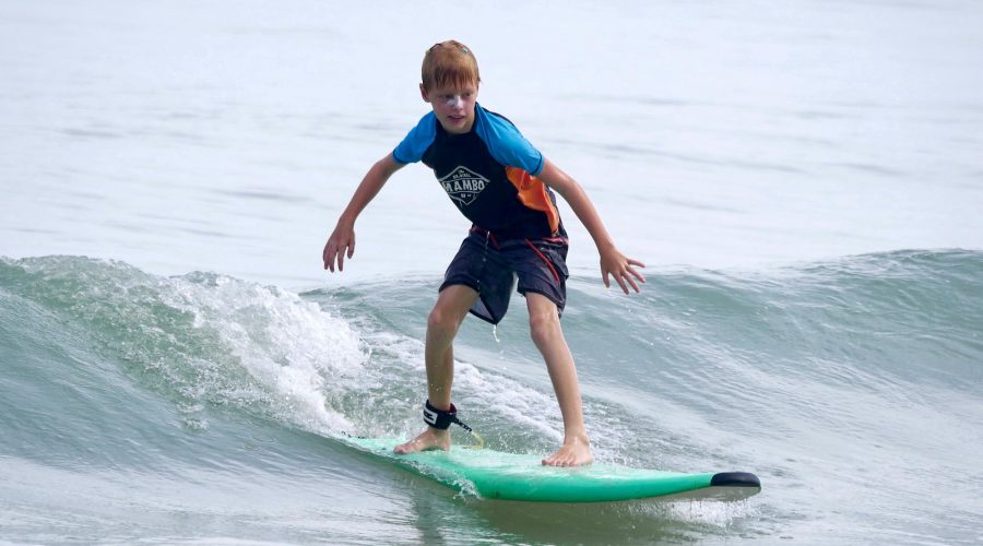 Surf Lessons For Kids in Phuket by talay surf school thailand